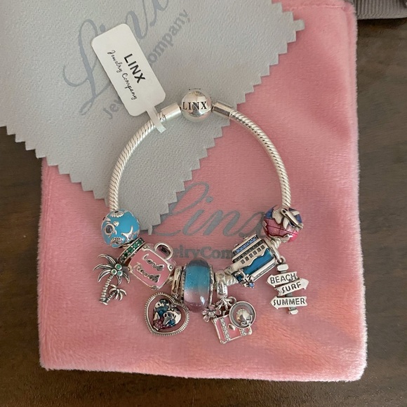 Linx Silver Snake Chain Bracelet with Travel and Vacation Themed Charms